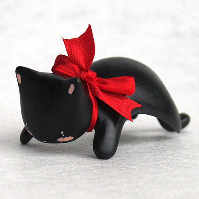 Small clinging cat (black) - Click Image to Close